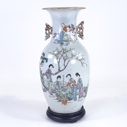 91 - A Chinese porcelain vase, hand painted figures in gardens, with pierced gilded handles, base drilled... 