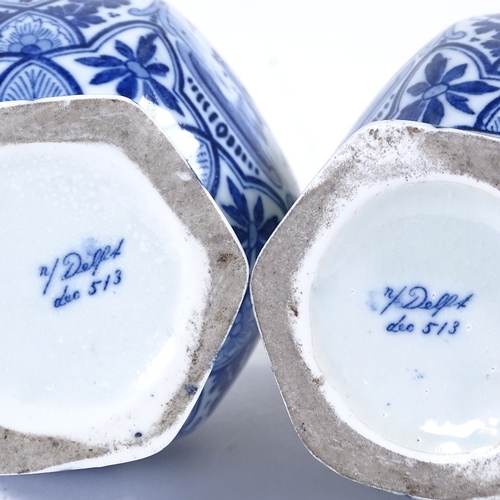 94 - A pair of Delft blue and white glaze narrow-neck vases, with harbour scenes, height 27cm, late 19th/... 