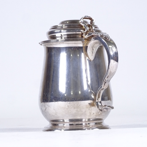 99 - A large electroplate lidded tankard, engraved under base The Benjamin Franklin Tankard, height 20cm