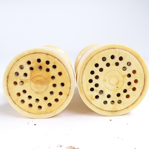 398 - A pair of 19th century ivory pepper grinders, height 10cm