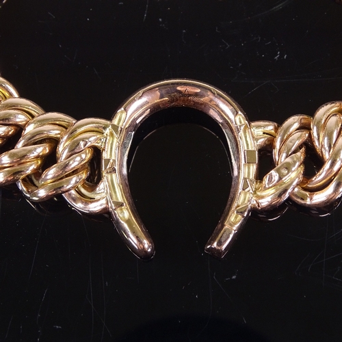 662 - A Victorian unmarked rose gold double curb link horseshoe bracelet, tests as 14ct gold, bracelet len... 