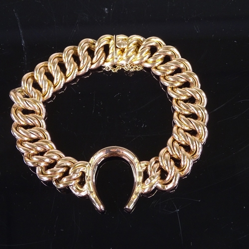 662 - A Victorian unmarked rose gold double curb link horseshoe bracelet, tests as 14ct gold, bracelet len... 