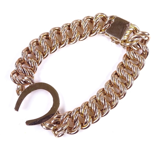 662 - A Victorian unmarked rose gold double curb link horseshoe bracelet, tests as 14ct gold, bracelet len... 