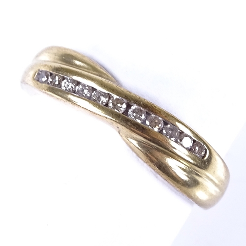 663 - A modern 9ct gold diamond cross-over ring, total diamond content approx 0.15ct, setting height 4.8mm... 