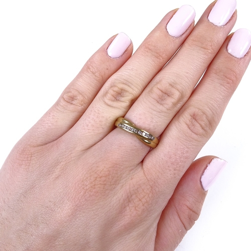 663 - A modern 9ct gold diamond cross-over ring, total diamond content approx 0.15ct, setting height 4.8mm... 