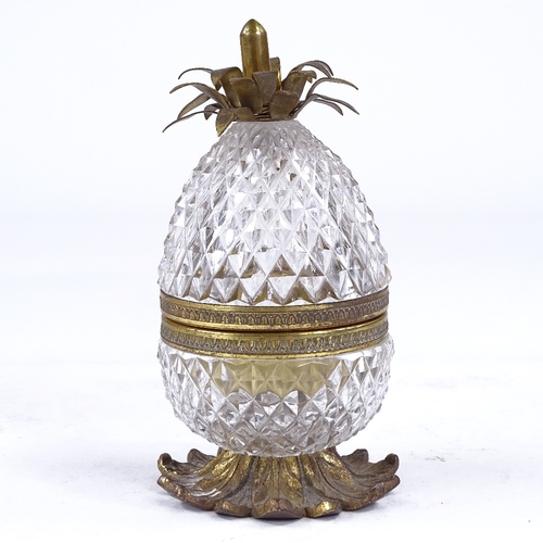 270A - A late 1930s Cristal et Bronze cut-glass and gilt-metal novelty desk inkwell, modelled as a pineappl... 