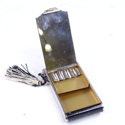 290A - An Art Deco chrome plate and black enamel combination compact/cigarette case, in the form of a foldi... 