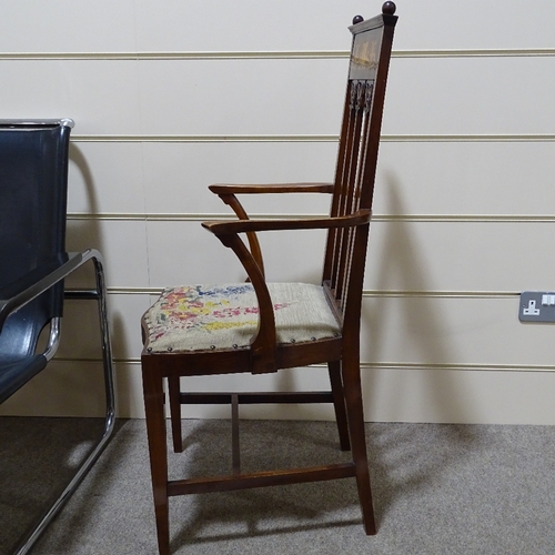 279 - An English walnut Art Nouveau marquetry inlaid elbow chair, in the manner of Liberty & Co