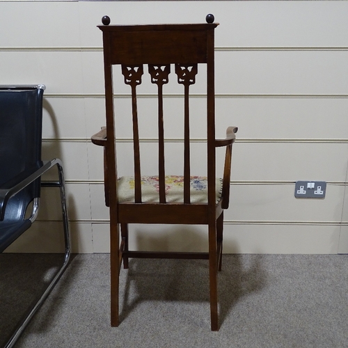 279 - An English walnut Art Nouveau marquetry inlaid elbow chair, in the manner of Liberty & Co