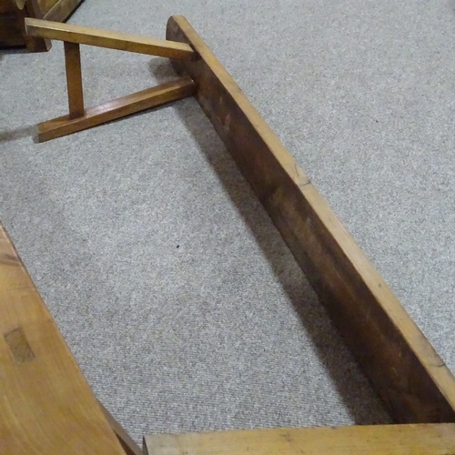 280 - A pair of 19th century French fruitwood trestle type benches, length 2m