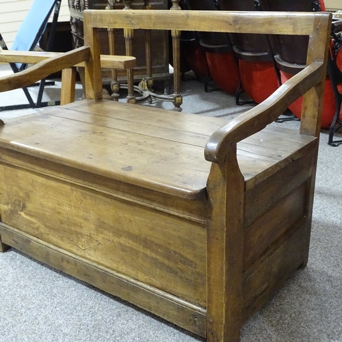 323 - A Georgian lambing settle with sliding front compartment under, length 84cm, height to front seat 40... 