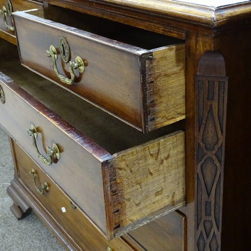 346 - A George III mahogany chest of 3 long and 2 short drawers, with blind fret carved corners, and ogee ... 