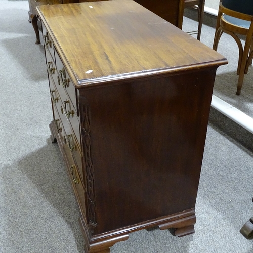 346 - A George III mahogany chest of 3 long and 2 short drawers, with blind fret carved corners, and ogee ... 