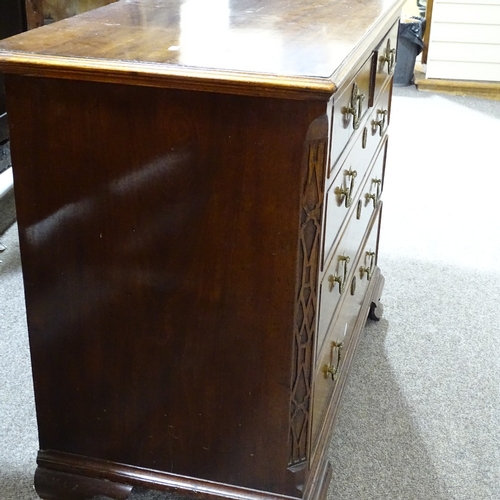 346 - A George III mahogany chest of 3 long and 2 short drawers, with blind fret carved corners, and ogee ... 