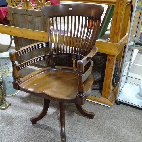 396 - A late 19th century mahogany bow-arm office chair