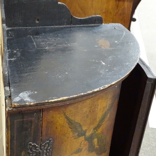 82 - A 19th century bow-front 2-door hanging corner cupboard, with painted religious scene, height to top... 