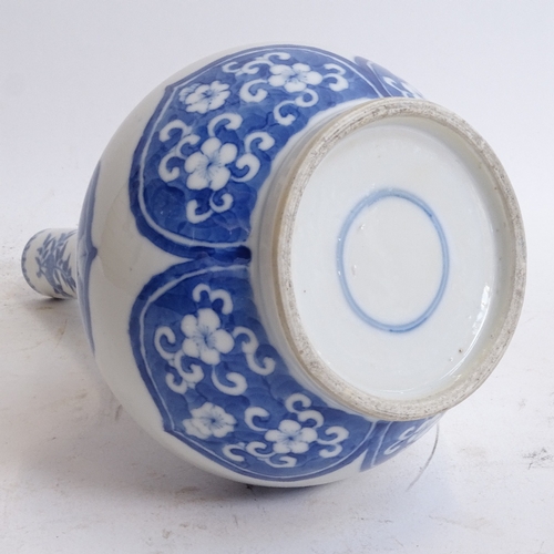 102 - A Chinese blue and white narrow-neck bottle vase, height 24cm