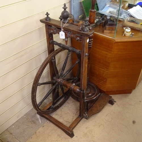 121 - A 19th century European spinning wheel, wheel diameter 56cm