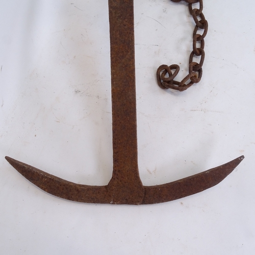 122 - A cast-iron ship's anchor, anchor height 66cm