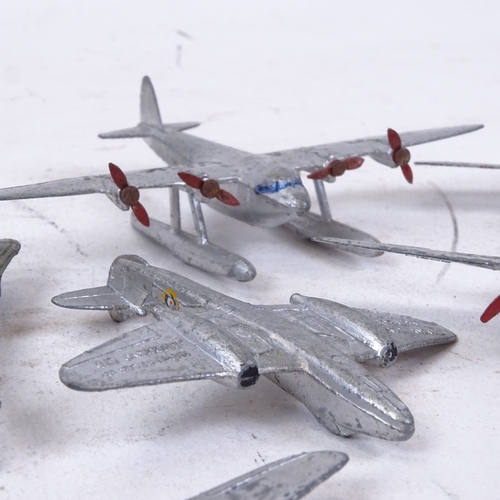 143 - A group of Vintage diecast Dinky Toys aeroplanes, including Seaplane, Meteor and Mirage