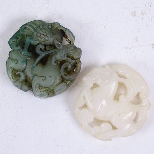 156 - A Chinese relief carved jade box and cover, diameter 8cm, and 2 relief carved jade pendants (3)