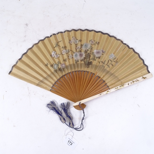 173 - A Japanese Meiji Period ivory and Shibayama fan with gilded decoration, and double-sided printed pap... 