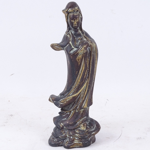 198 - A Chinese bronze figure of Guan Yin, height 23cm