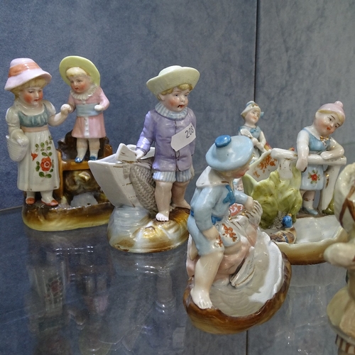 208 - A group of 19th century Continental porcelain figures, and trinket pots (10)