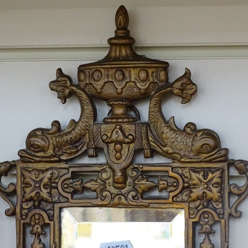 225 - A small ornate gilt-brass framed wall mirror, height 49cm