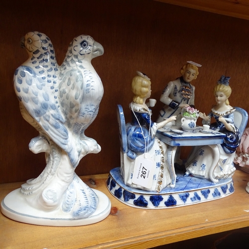 267 - A group of ceramics, including Czechoslovakian basket surmounted by a cherub