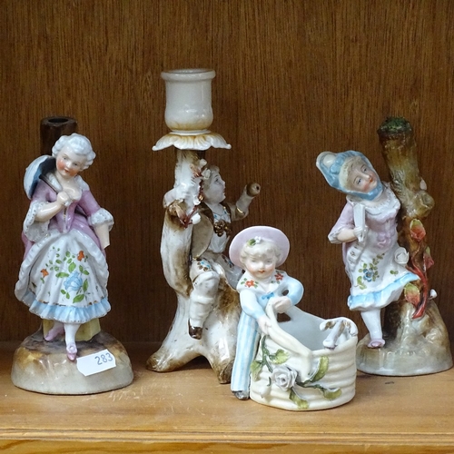 283 - A group of 19th century Continental porcelain candle holders and Vesta stands (13)