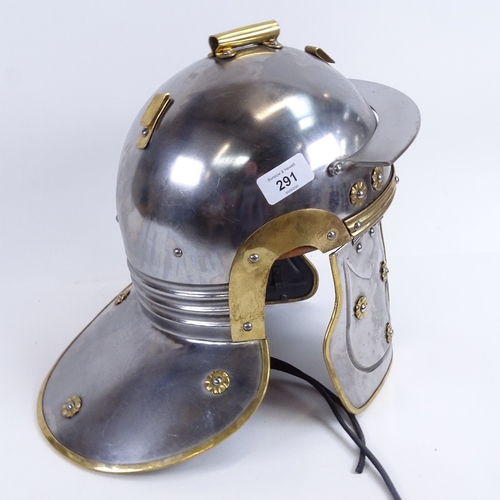 291 - A handmade military re-enactment steel and brass Roman style helmet, 16 gauge steel