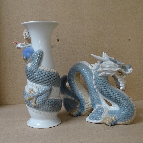 312 - A porcelain ornamental dragon, length 26cm, and a similar porcelain vase (2)