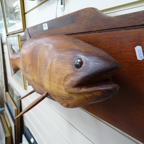 387 - Clive Fredriksson, a carved and stained wood 3-dimensional fish on wood plaque, length 80cm