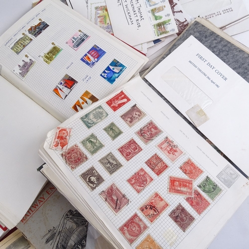 411 - 2 albums of British stamps and 2 albums of world stamps etc, and a cigarette card album of railway e... 