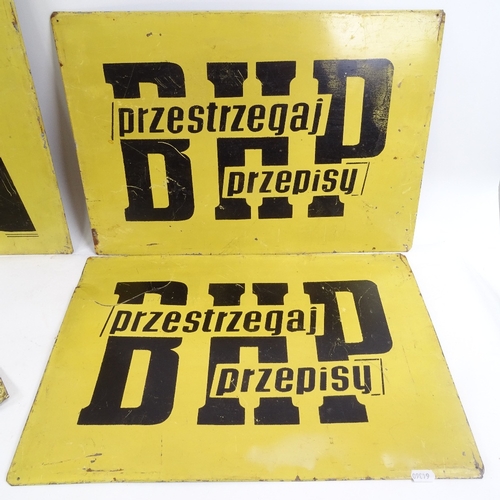 416 - A painted Polish tin sign warning of electric shocks, height 25.5cm, and 3 similar larger signs