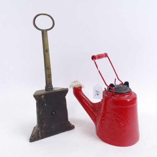 417 - Antique brass-faced iron doorstop, 38.5cm, and a Wells Unbreakable cast-iron lantern with handle