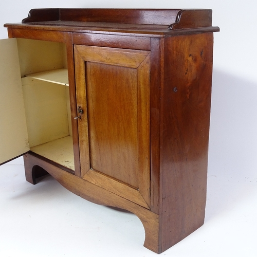 452 - A table-top mahogany cabinet with gallery, length 55cm