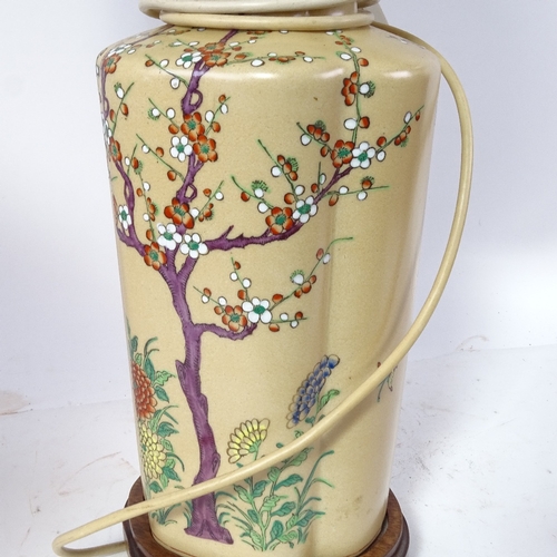 454 - An Oriental ceramic table lamp with painted decoration, and shade, 74cm overall