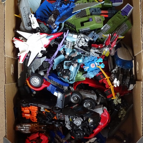 490 - A box of Transformer vehicles and models