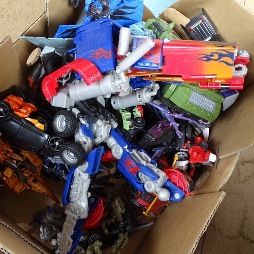 490 - A box of Transformer vehicles and models