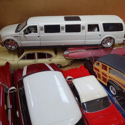 492 - A box of diecast vehicles, including Burago and Maisto