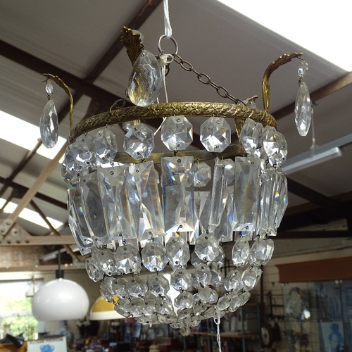 499 - A gilt-mounted light fitting with glass lustre drops