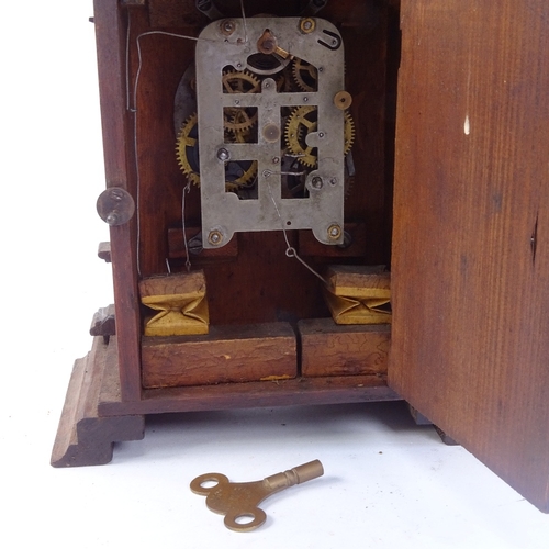 507 - A 19th century Continental carved wood-cased cuckoo clock, height 32cm, an American rosewood-cased k... 