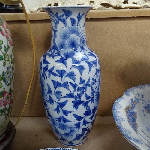 516 - A blue gilt pottery wash jug and basin, a modern Chinese blue and white vase, and other blue and whi... 