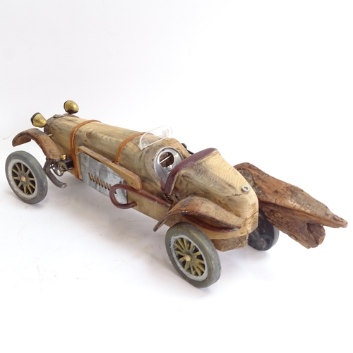 54 - Clive Fredriksson, handmade carved and painted wood sculpture, Vintage touring car, length 50cm