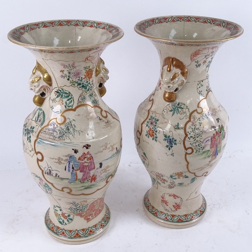 546 - A pair of 19th century Japanese painted and gilded vases, height 39cm (both with hairline cracks)