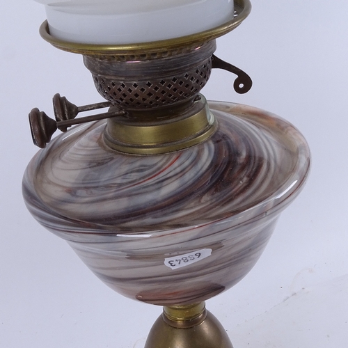 551 - A Victorian brass and marbled-glass oil lamp, with glass shade, height to shade 52cm