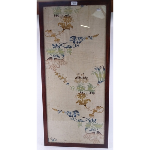 560 - An 18/19th century silk panel from part of a wedding dress, in stained wood frame, 97cm x 45cm