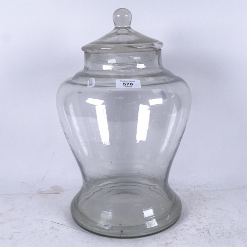 576 - A large hand-blown Victorian glass jar and cover, height 37cm